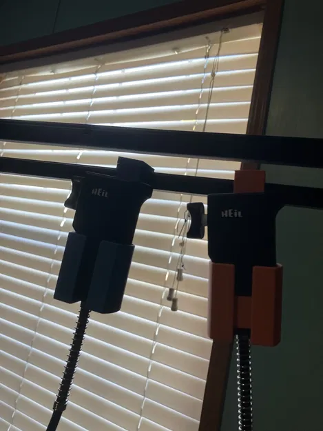 Cái Kẹp Giữ Nút Bấm Tay Micro Heil - Image 1