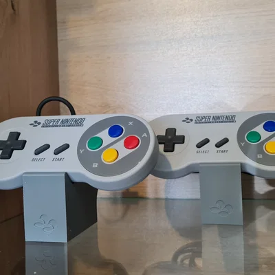 Chân đế trưng bày tay cầm SNES