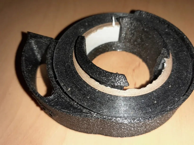 Dụng cụ gỡ/giữ băng keo điện - Image 1
