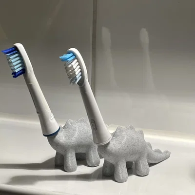 Chân Đựng Đầu Bàn Chải Hình Khủng Long Dễ Thương