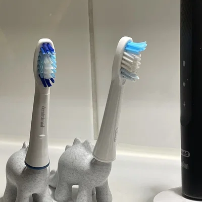 Chân Đựng Đầu Bàn Chải Hình Khủng Long Dễ Thương