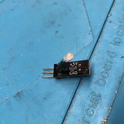 Filament sensor cover with LED insertion indicator