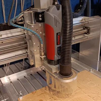 Dustshoe vacuum connector