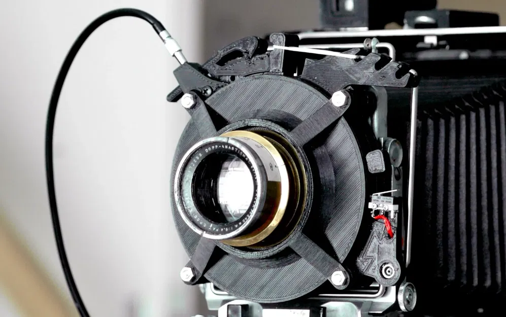 Lá Màn Trập Máy Ảnh Khổ Lớn Cơ Khí - Image 1