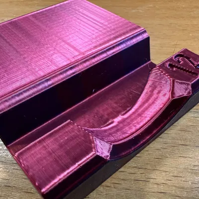 Kệ điện thoại có khe để ngón tay