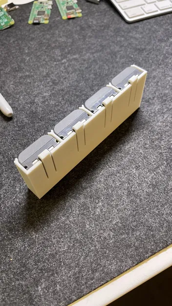 Kệ Pin Máy Ảnh Canon NB-2LH - Image 1