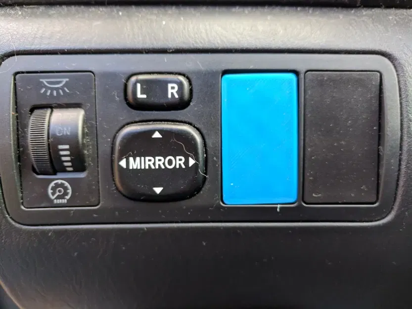2003 Corolla Accessory button cap - Image 1