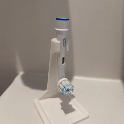 Oral b head stand with dripping tray.
