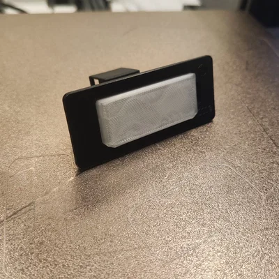 Chóa đèn Biển Số Xe Volkswagen Passat 2009