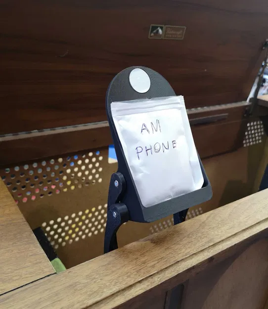 "Stow-away" Cantilevered Phone Stand with NFC tag recess and magnetic position lock - Image 1