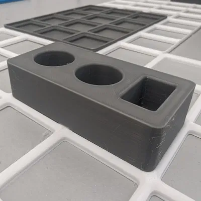 Kệ Vaporesso XROS Gridfinity kiêm Hộp Đựng Tinh Dầu