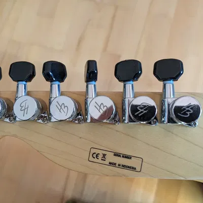 Núm Chỉnh Dây Đàn Guitar