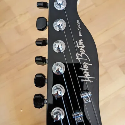 Núm Chỉnh Dây Đàn Guitar