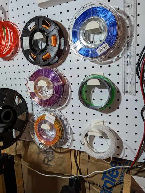 Small Filament Reel, spool or remnant holder for Pegboard - Image 1
