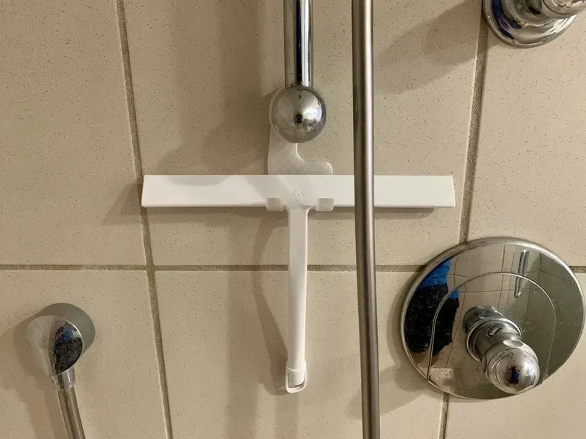 Giá đỡ cây gạt nước vòi sen cho thanh trượt Hansgrohe - Image 1