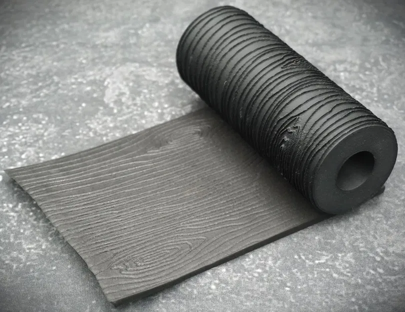 Textured Roll With Wood Grain Pattern - Image 1