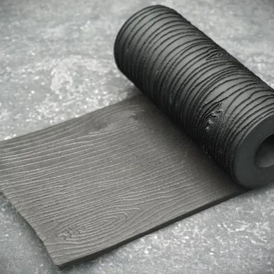 Textured Roll With Wood Grain Pattern