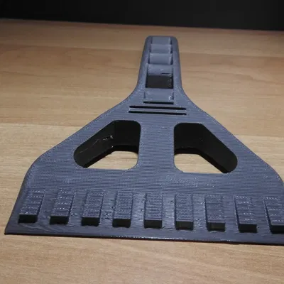 Dụng cụ cạo băng