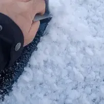 Dụng cụ cạo kính chắn gió có tấm chắn tích hợp