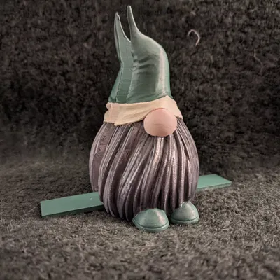 Chân giữ giấy ăn hình ông lùn