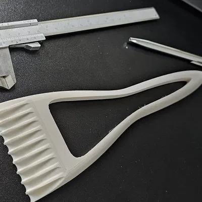 Dụng Cụ Cạo Băng Có Tay Cầm Kiểu Bàn Chải (2 Phiên Bản)