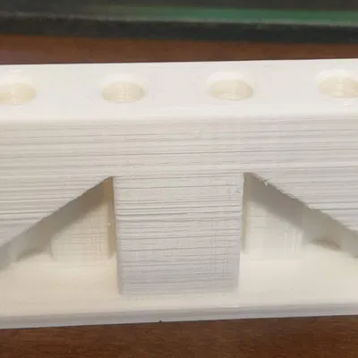 Giá đỡ đầu phun Revo không chữ