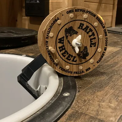 Giá Đỡ Rattle Reel Âm Nắp