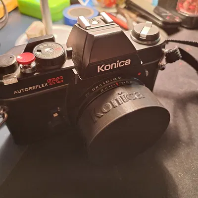 Nắp Che Ống Kính Konica