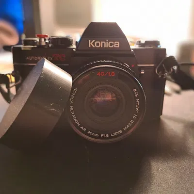 Nắp Che Ống Kính Konica