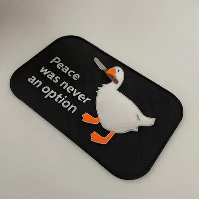 Tấm khiên "Untitled Goose Game - Peace was never an option"