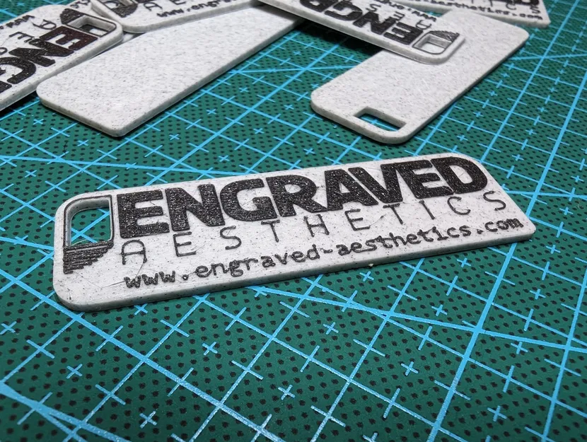 Móc Khóa Logo Engraved Aesthetics LLC - Image 1