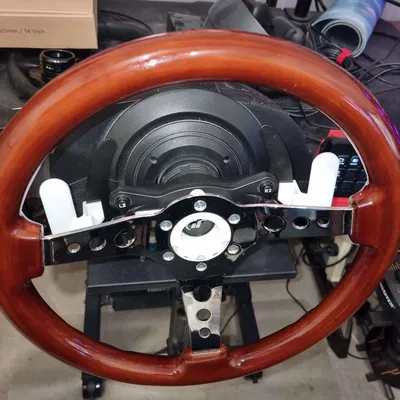 Thrustmaster T300 Wheel adaptor (with directional pad holder) + Paddle shifters.