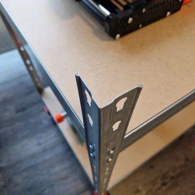 Cover cap for a heavy-duty shelf