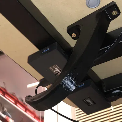 Unter-table headset holder