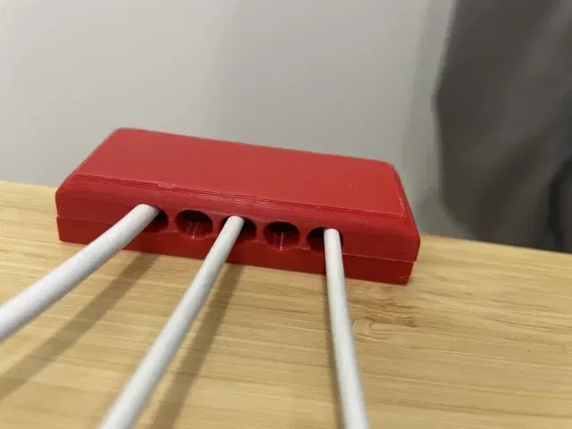 Magnetic cable organizer for desk with clamps - Image 2