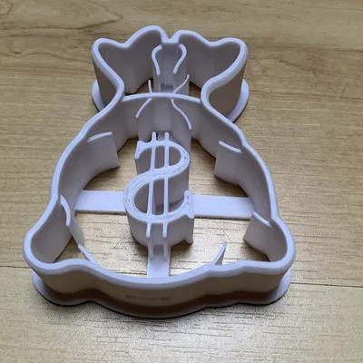 cookie cutter from money bag