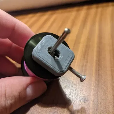 Dụng cụ tháo chốt trục cuộn dây câu cá