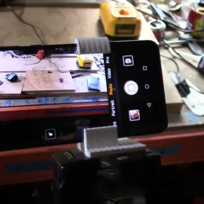 Giá đỡ điện thoại gắn tripod