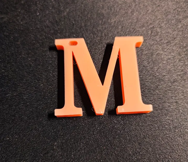 Móc khóa Chữ M có lỗ - Image 1