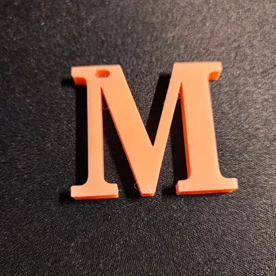 Móc khóa Chữ M có lỗ