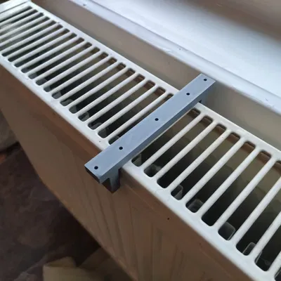 Radiator windowsill mount
