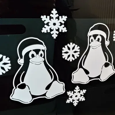 Tux Giáng Sinh với bông tuyết