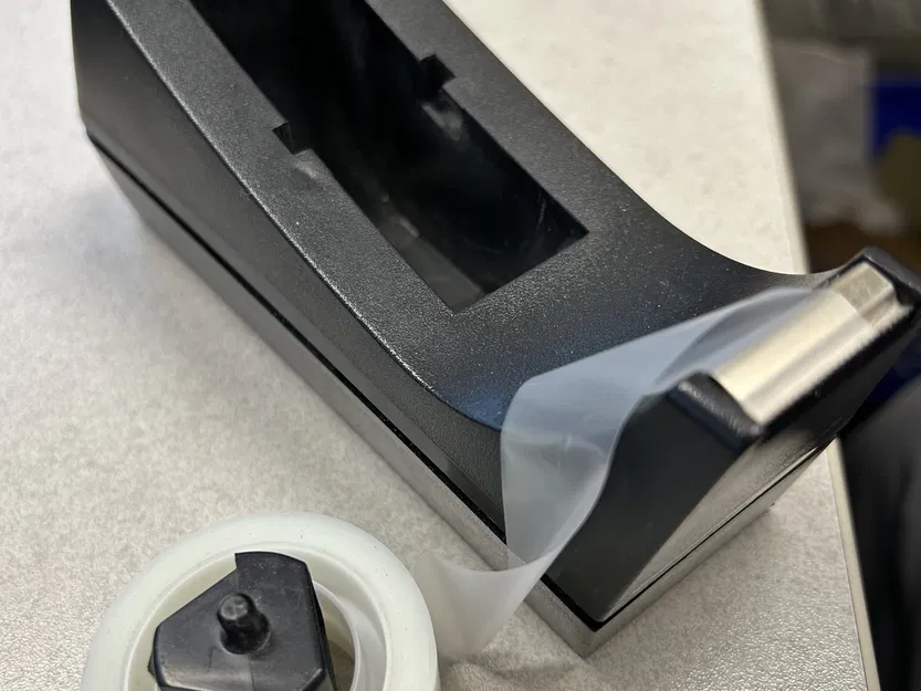 Adaptateur pour rouleaux adhésif. - Image 1