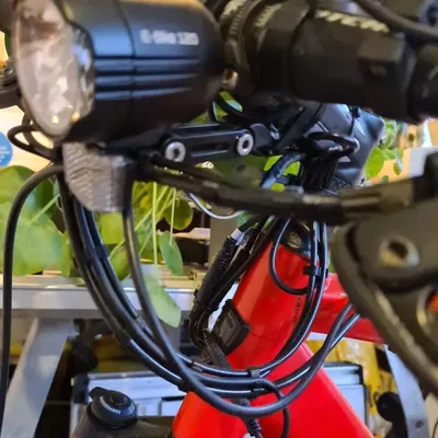 Different clips for holding bike cables