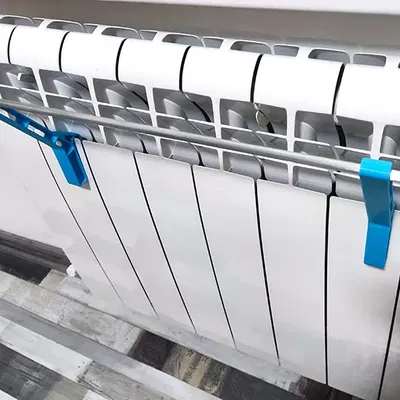 Móc treo phơi đồ trên máy sưởi