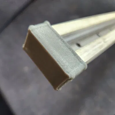 light track flexible end cap for transport