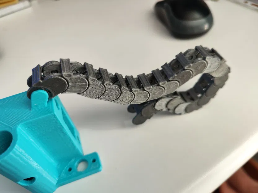 CADENA RECOGE CALBES - Chuỗi thu dây cho trục X máy in Cartesian - Image 1