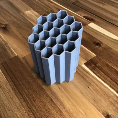 Giá đỡ bút hình tổ ong