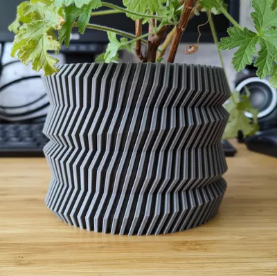 Chậu Cây Hình Bánh Răng Xoay