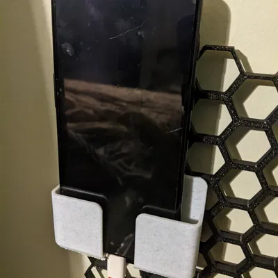 Giá đỡ điện thoại dạng tổ ong treo tường